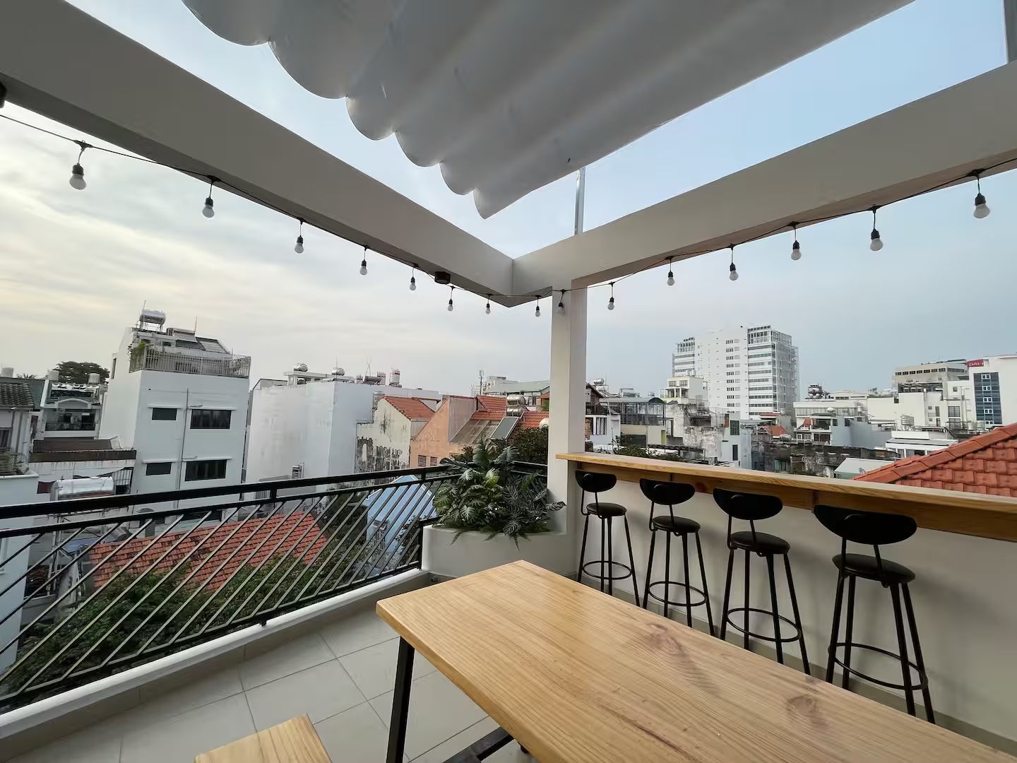 The rooftop terrace, over Phú Nhuận's rooftops